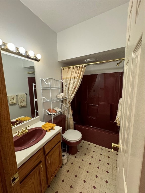 full bathroom with shower / bath combo with shower curtain, vanity, and toilet