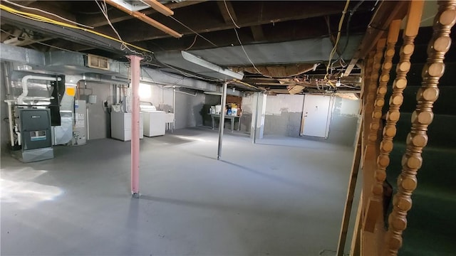 2601 Mount Royal Blvd, Shaler, PA 15116 - unfinished below grade area featuring heating unit, washer and dryer, and water heater