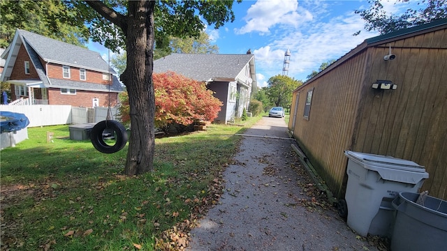 view of home's exterior featuring a yard