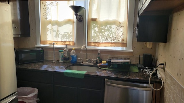 2601 Mount Royal Blvd, Shaler, PA 15116 - kitchen with dishwasher, black microwave, a sink, freestanding refrigerator, and wallpapered walls