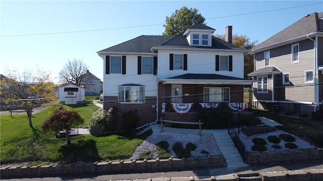 view of front of property with a front lawn