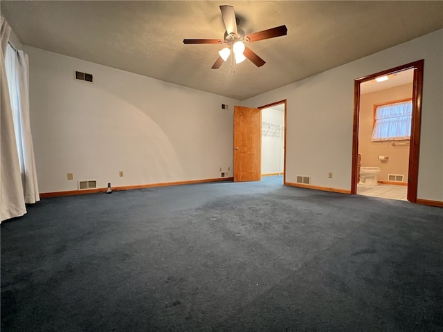 empty room with light carpet and ceiling fan