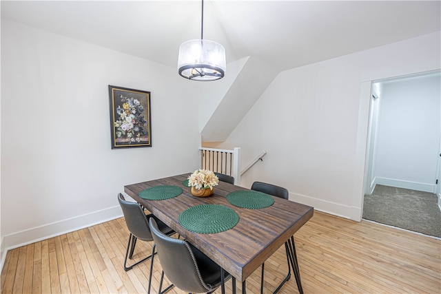 dining space with light wood-type flooring