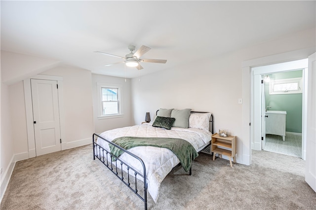 bedroom with light colored carpet and ceiling fan