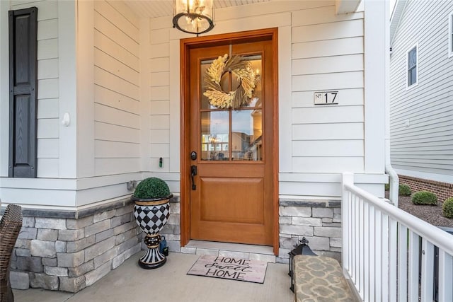 17 Carolina Ave, Oakmont, PA 15139 - view of exterior entry featuring covered porch and stone siding