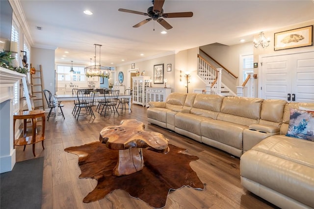 17 Carolina Ave, Oakmont, PA 15139 - living area with a chandelier, stairs, recessed lighting, ornamental molding, and a ceiling fan