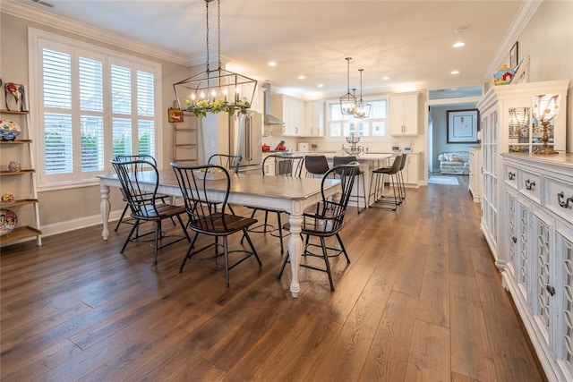 17 Carolina Ave, Oakmont, PA 15139 - dining area with crown molding, dark wood-type flooring, a chandelier, and recessed lighting