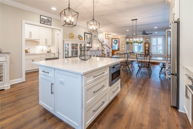 17 Carolina Ave, Oakmont, PA 15139 - kitchen with a chandelier, recessed lighting, dark wood-style floors, white cabinetry, and hanging light fixtures