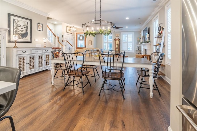 17 Carolina Ave, Oakmont, PA 15139 - dining area featuring wood finished floors, stairway, crown molding, recessed lighting, and a chandelier