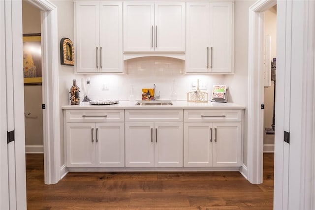 17 Carolina Ave, Oakmont, PA 15139 - kitchen with white cabinets, light countertops, dark wood-type flooring, and tasteful backsplash