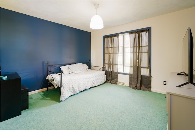 bedroom featuring carpet