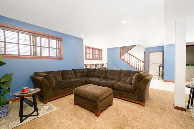 living room featuring light colored carpet