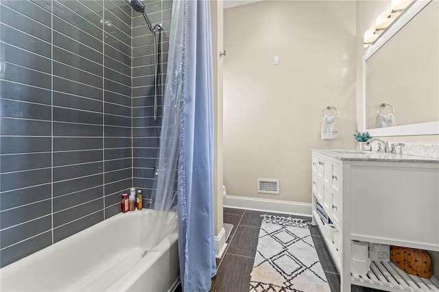 full bathroom with toilet, shower / bath combination with curtain, vanity, and wood-type flooring