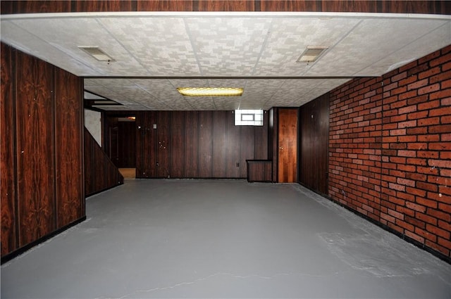 1011 Greenock Buena Vista Rd, Elizabeth Twp/Boro, PA 15135 - below grade area featuring wood walls and brick wall
