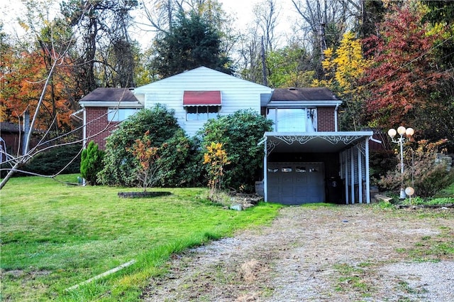 1011 Greenock Buena Vista Rd, Elizabeth Twp/Boro, PA 15135 - view of front of home with driveway, a front yard, a garage, and brick siding