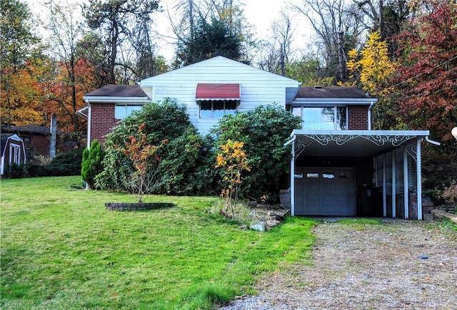 1011 Greenock Buena Vista Rd, Elizabeth Twp/Boro, PA 15135 - view of front facade featuring a front yard, a carport, dirt driveway, and brick siding