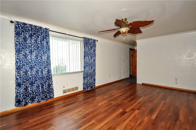 unfurnished room featuring hardwood / wood-style floors and ceiling fan