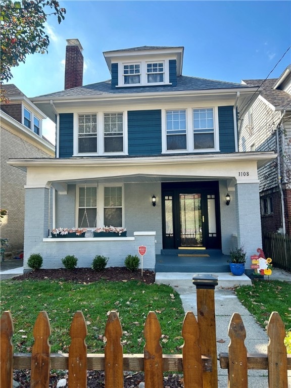 view of front property with covered porch