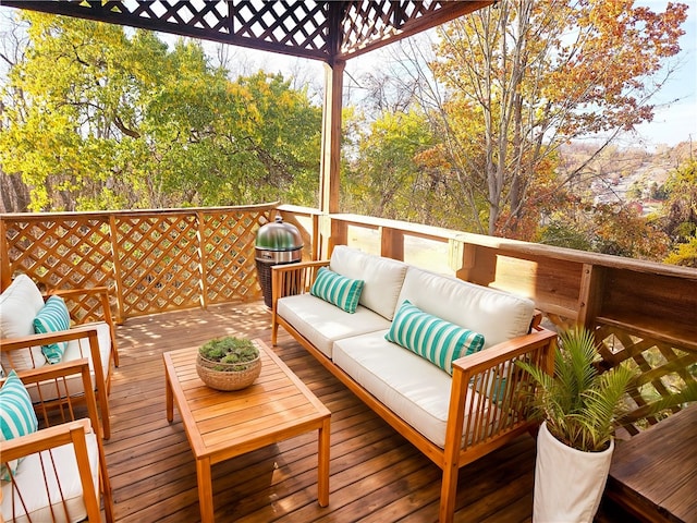 wooden deck featuring outdoor lounge area