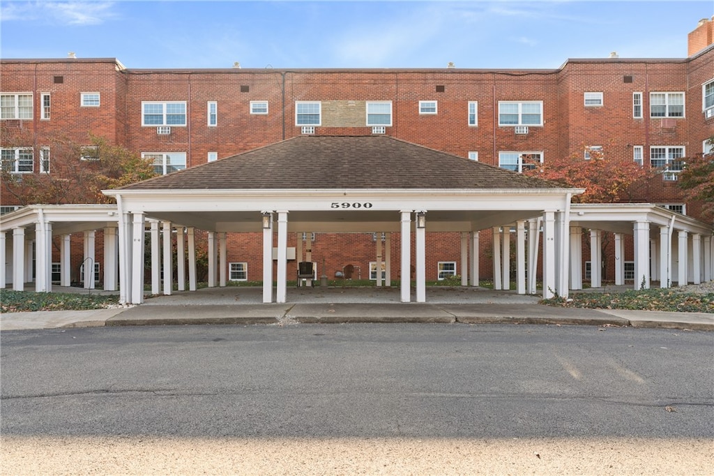 view of building exterior featuring a carport