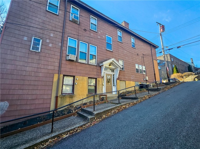 view of building exterior featuring cooling unit