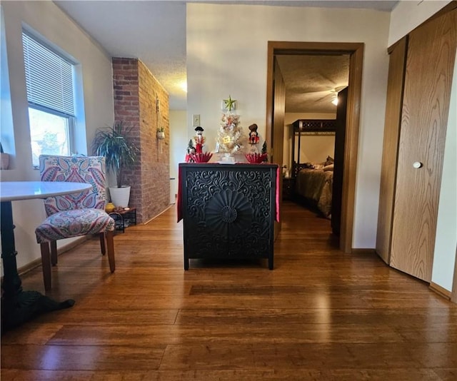 corridor featuring hardwood / wood-style floors