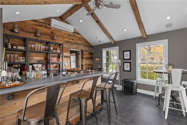 bar featuring a wall mounted air conditioner, ceiling fan, vaulted ceiling with beams, dark hardwood / wood-style floors, and wood walls