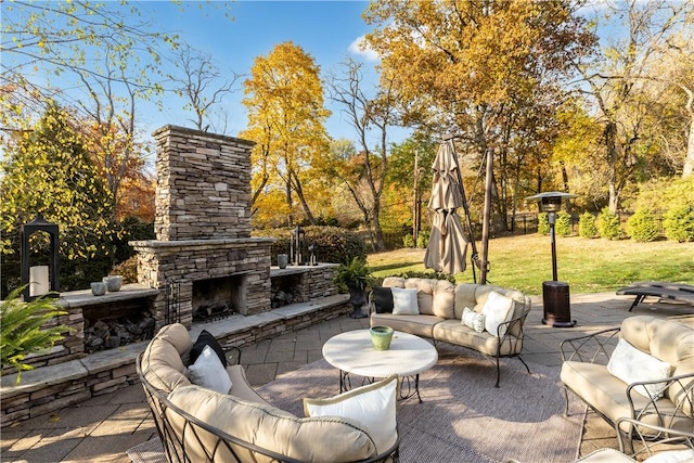 view of patio / terrace featuring an outdoor living space with a fireplace