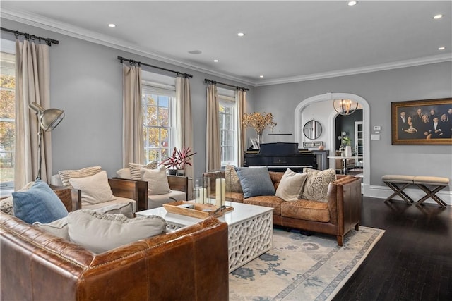 living room featuring hardwood / wood-style floors and crown molding