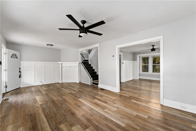 interior space featuring hardwood / wood-style flooring and ceiling fan