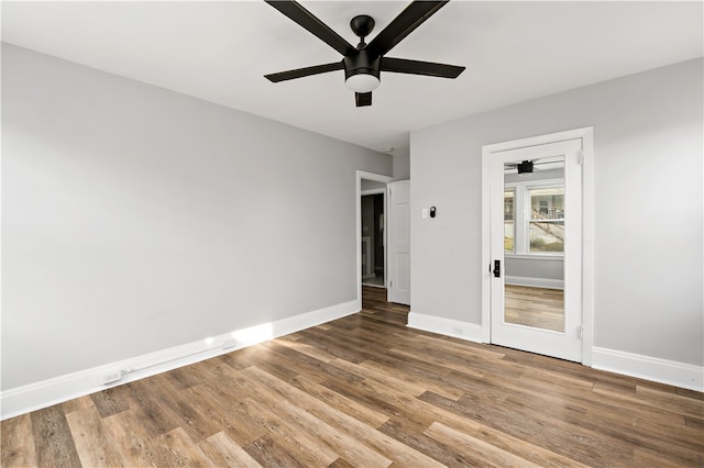 unfurnished bedroom with hardwood / wood-style floors and ceiling fan