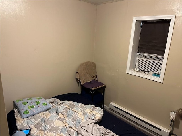 126 Park Ave, New Castle/2Nd, PA 16101 - bedroom with cooling unit and a baseboard heating unit