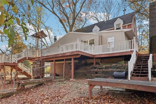 rear view of house with a deck