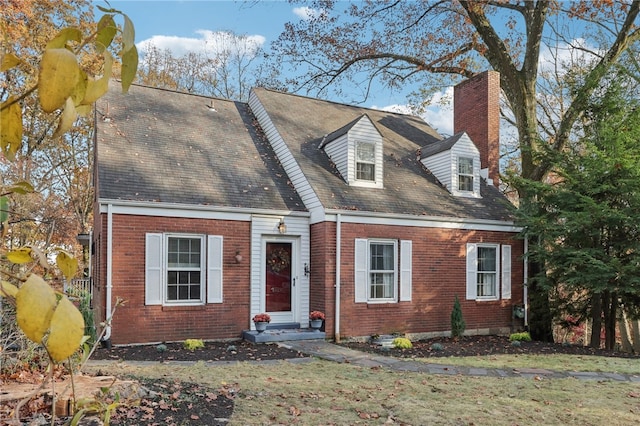 view of new england style home