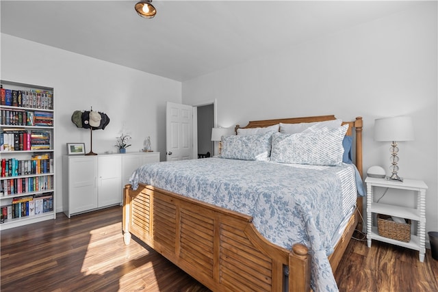 bedroom featuring dark wood-type flooring