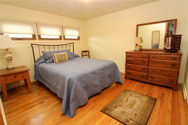 bedroom featuring light hardwood / wood-style floors