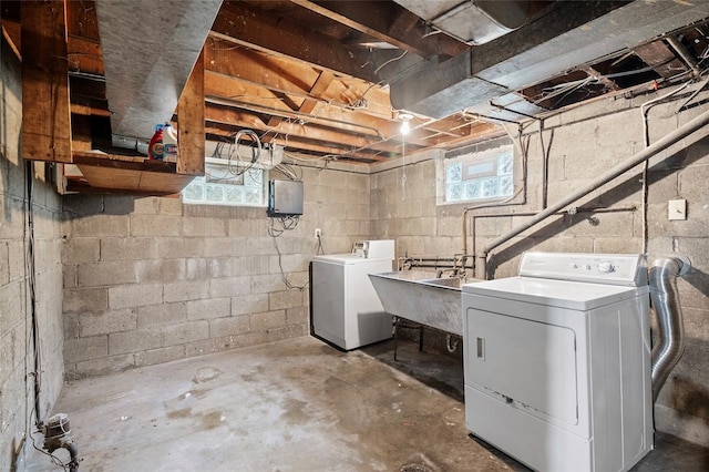 washroom with washer and dryer