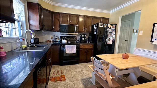 kitchen featuring black appliances, dark brown cabinets, crown molding, and sink