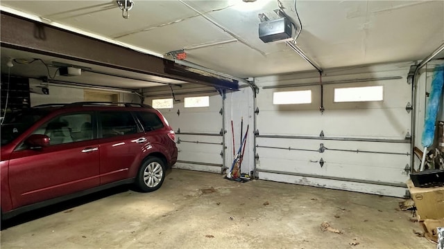 garage featuring a garage door opener