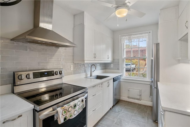 420 Sulgrave Rd, Mt Washington, PA 15211 - kitchen with appliances with stainless steel finishes, wall chimney exhaust hood, a sink, and white cabinets
