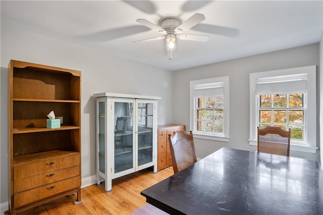 office area with hardwood / wood-style floors and ceiling fan