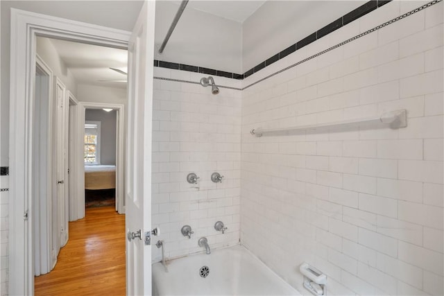 420 Sulgrave Rd, Mt Washington, PA 15211 - bathroom featuring bathtub / shower combination and wood finished floors