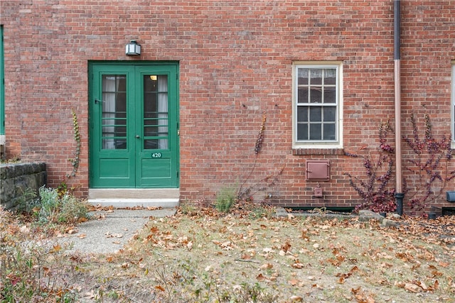 property entrance featuring french doors