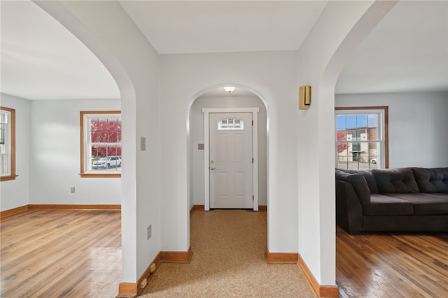 foyer with hardwood / wood-style flooring