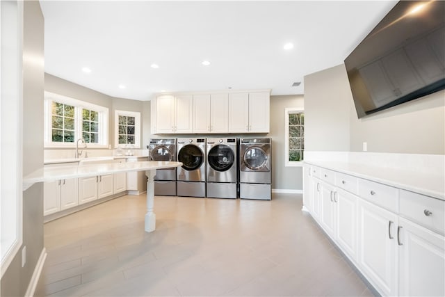 washroom featuring independent washer and dryer