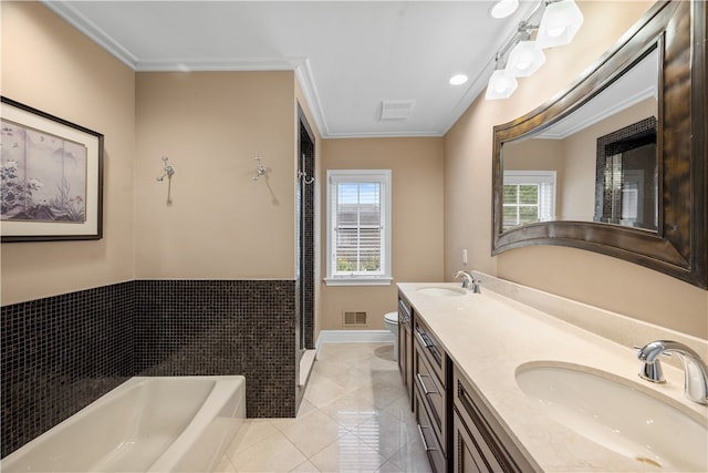 bathroom featuring toilet, vanity, a tub, and crown molding