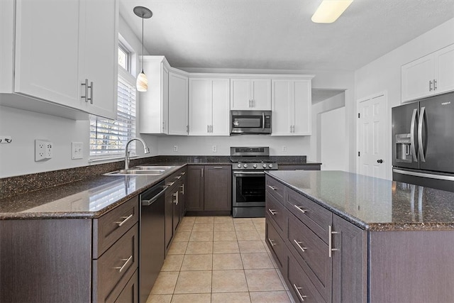 kitchen with white cabinetry and stainless steel appliances