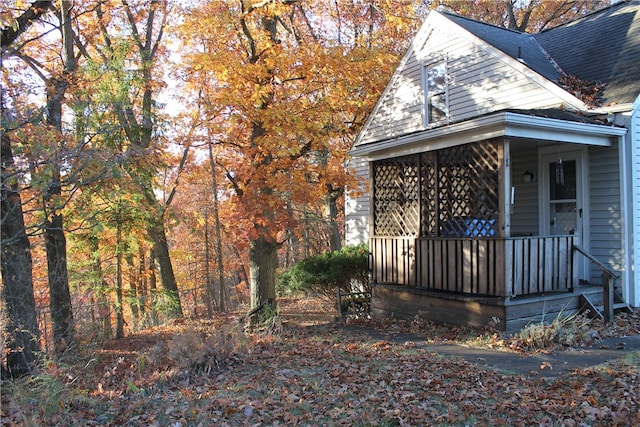 view of home's exterior featuring covered porch