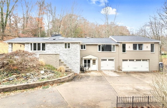 view of front of house with a garage