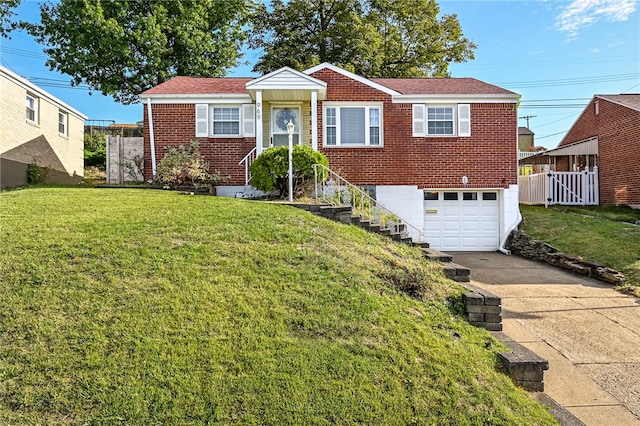 view of front of home featuring a garage and a front yard